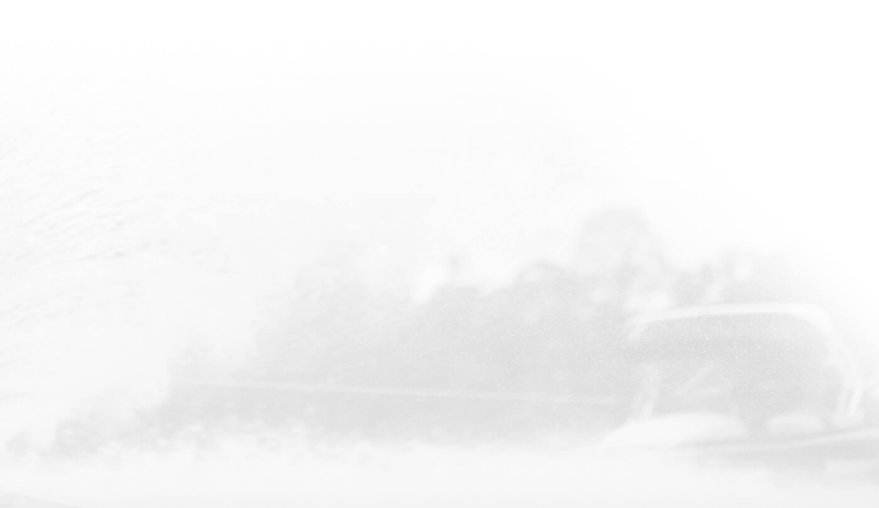 Faded water ski boat moving in lake.