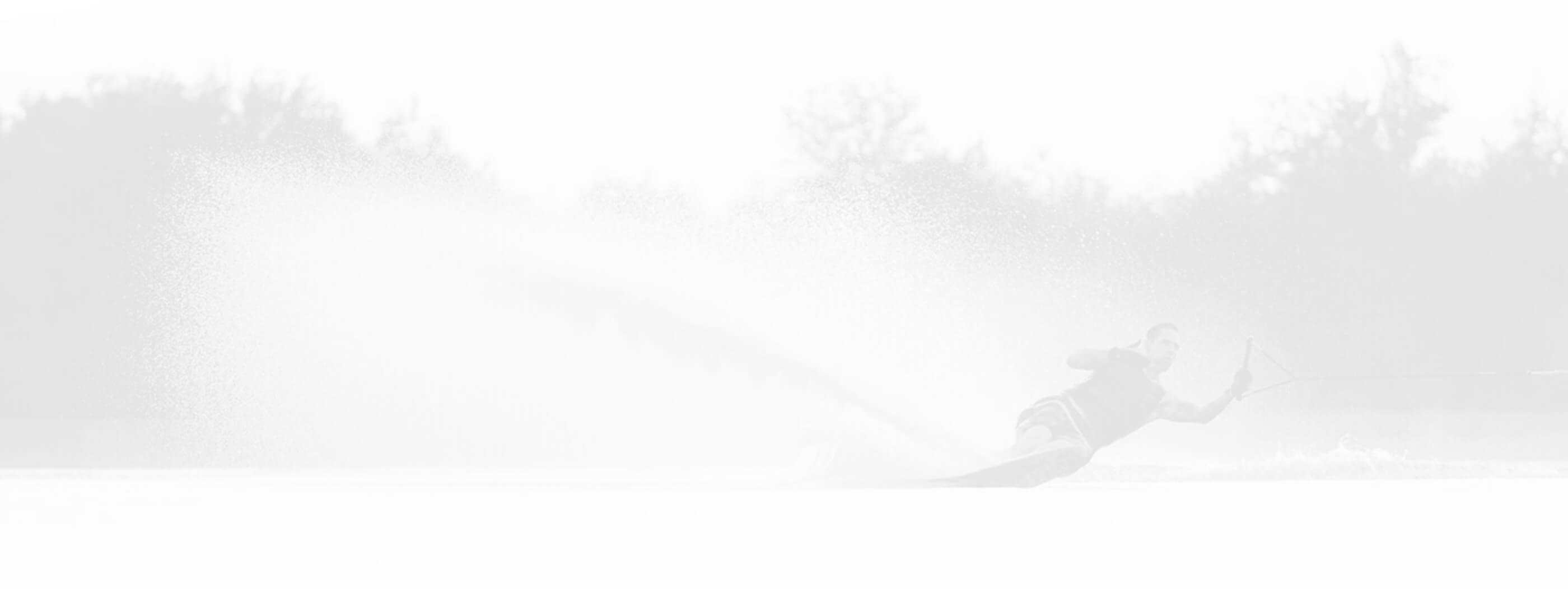 Faded water skier in lake.